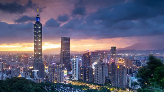 The Color cityscape with skyscraper and buildings under blue sky in night in Taipei Taiwan