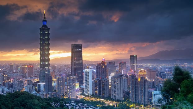 The Color cityscape with skyscraper and buildings under blue sky in night in Taipei Taiwan