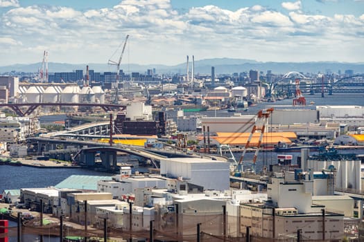Aerial view kobe cityscape and Port industrial zone in Kobe Hyogo Kansai Japan using for import export shipping and global business background