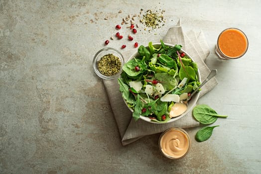 Healthy salad with spinach and seeds. Home made food. Concept for a tasty and healthy meal.