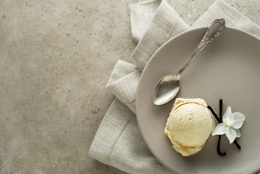 Homemade Organic Vanilla Ice Cream scoop in a plate close up