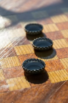 caps on a chessboard