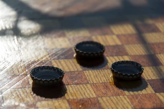 caps on a chessboard