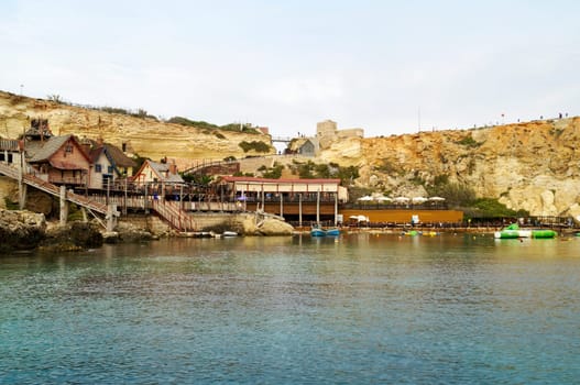 POPEYE VILLAGE, MALTA - SEPTEMBER 23, 2017: The famous Popeye Village, also known as Sweethaven Village near Mellieha, Malta