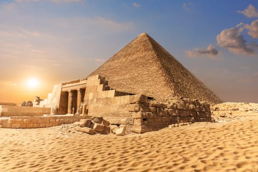 Mastaba of Seshemnefer IV and the Pyramid of Cheops in Giza.
