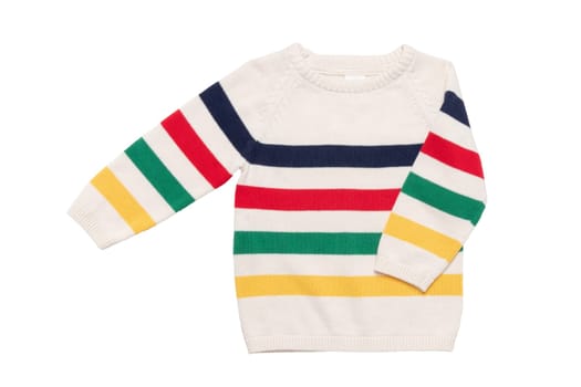 Autumn and winter children clothes. Close-up of colorful striped cozy warm sweater or pullover isolated on a white background. Kids autumn fashion.