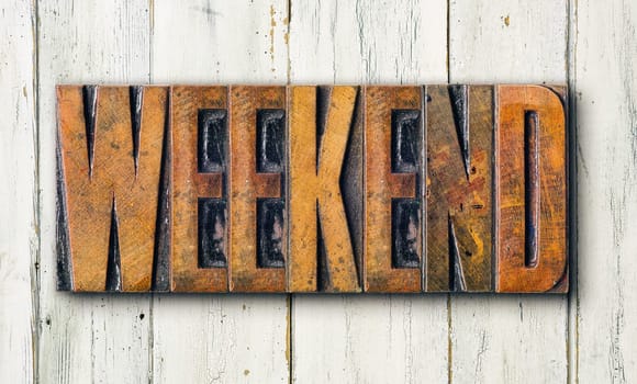 Antique letterpress wood type printing blocks on a white backgound - Weekend