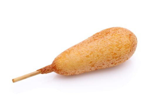 Corn dogs on a plate. This food is called American dog all over Japan.