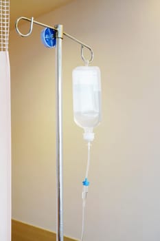 Saline solution drip for patient and infusion pump in hospital