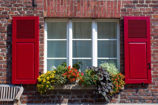 Old German house with window with wooden shutters, Wachtendonk, North-Rhine Westphalia, Germany