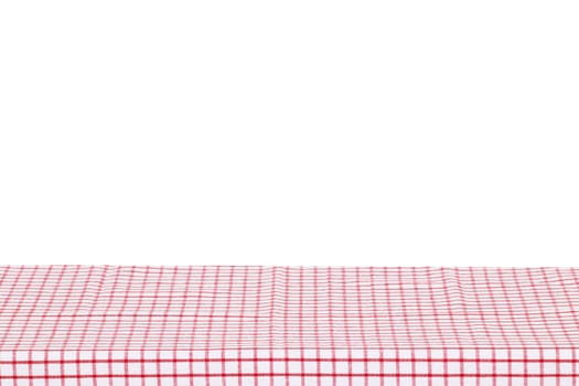 Empty table background. Empty wooden deck table covered with red white checkered tablecloth isolated on a white background. Space for your food and product display montage.