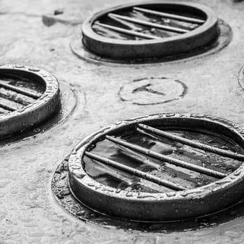Brass porthole of an old sailboat, close-up