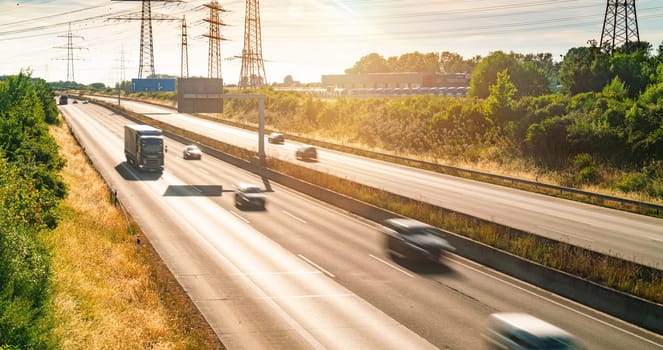 Lots of Trucks and cars on a Highway - transportation concept