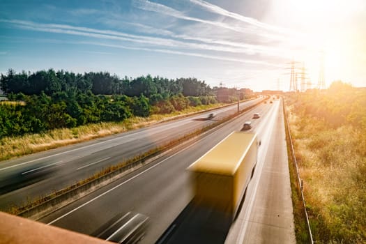 Lots of Trucks and cars on a Highway - transportation concept