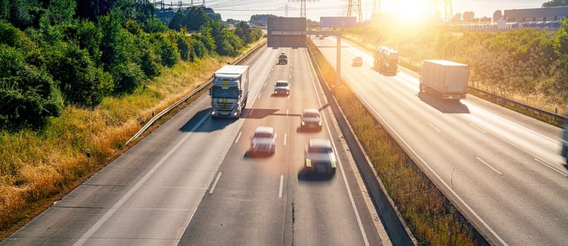 Lots of Trucks and cars on a Highway - transportation concept