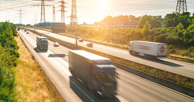 Lots of Trucks and cars on a Highway - transportation concept