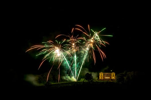 Fireworks over the Villa Ludwigshoehe in Germany Rhineland Palatinate at night