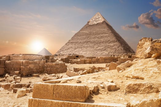 Ruins and the Pyramids, beautiful view of Giza, Egypt.