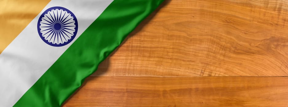 National flag of India on a wooden background with copy space