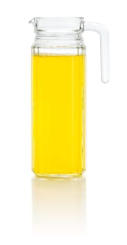 An orange soft drink in a pitcher
