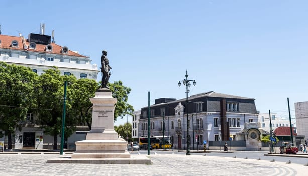 Daily life at the beautiful Luis de Camoes Square in Lisbon, Portugal