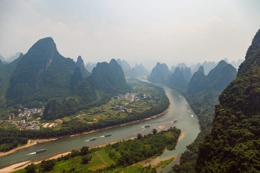 Landscape of Guilin, Li River and Karst mountains. Located near The Ancient Town of Xingping, Yangshuo County, Guangxi Province, China.