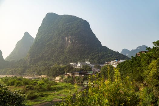 Mountains and Valley in Yangshuo Province, China, early foggy morning