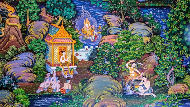 LAMPHUN, THAILAND - NOVEMBER 16, 2015 : Native Thai Buddhist mural painting of the life of buddha on temple wall at Wat Phra That Ha Duang in Lamphun, Thailand