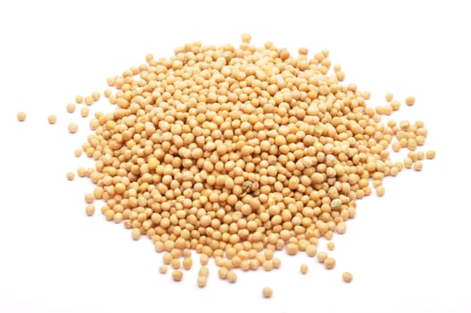 Mustard seeds on white background