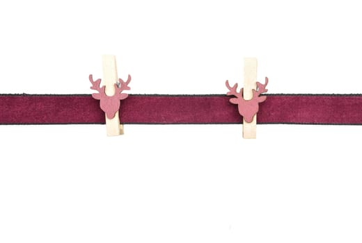 Background with clared-red ribbon and pegs