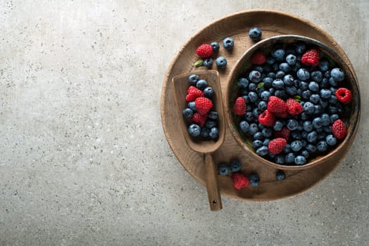 Berries overhead closeup colorful assorted mix of blueberry and raspberry