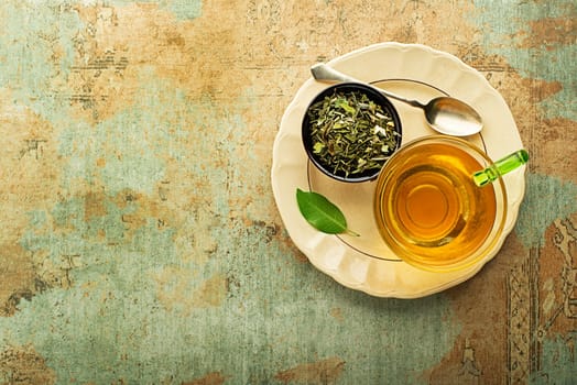Cup of tea with dry tea- classic black and green tea flavour