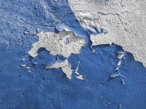 Blue wall with the peeled-off paint. It can be used as background.