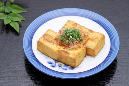 Japanese food, Age tofu cuisine on black background