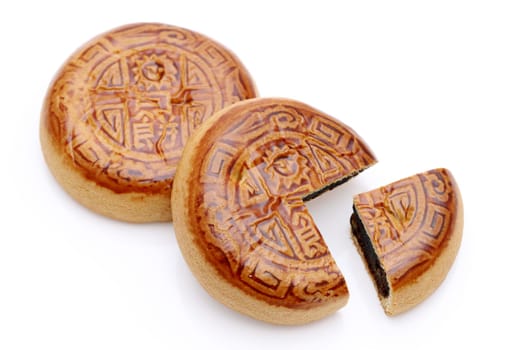 Traditional mooncake for Chinese mid autumn festival, on white background