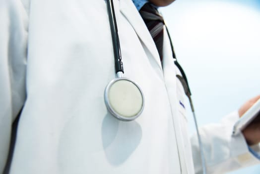 Man doctor with a black stethoscope