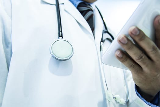 Man doctor with a black stethoscope