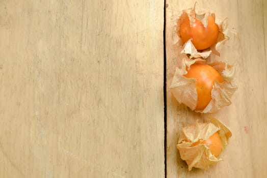 Top view and close up orange organic cape gooseberry fruit