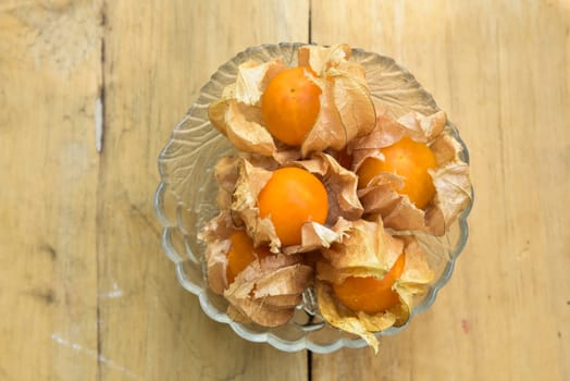 Top view and close up orange organic cape gooseberry fruit