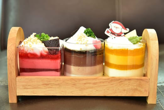 Beautiful cupcakes on wooden background, closeup