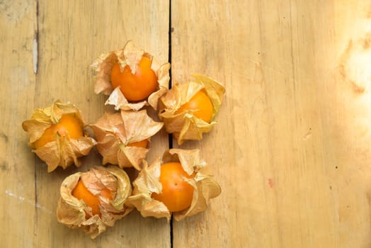 Top view and close up orange organic cape gooseberry fruit
