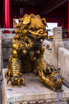 Beijing, China April 2013 The bronze lion in the Forbidden City, popular tourist attraction