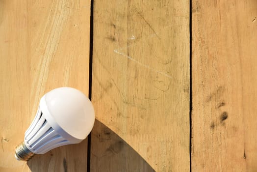 Led lamp on wooden floor