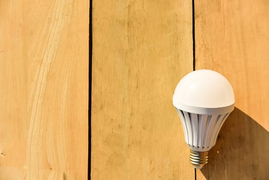 Led lamp on wooden floor