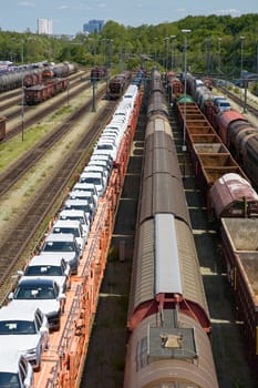 Munich, Germany - July 10, 2019: German railroad cargo station Munich North with standing trains. Vertical view from above