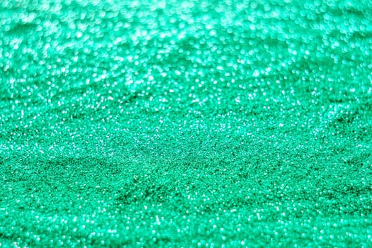 Glitter light abstract cyans bokeh christmas light blurred background