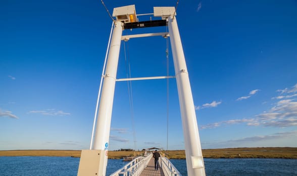 Tavira, Portugal - October 14th, 2018: Tavira Island pedestrian drawbridge, built to access by land to Barril Beach, Algarve, Portugal