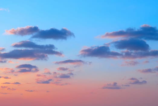 Romantic sunset with beautiful blue, red and yellow clouds.