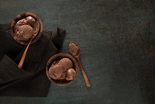 Homemade Organic chocolate Ice Cream scoops in bowls close up