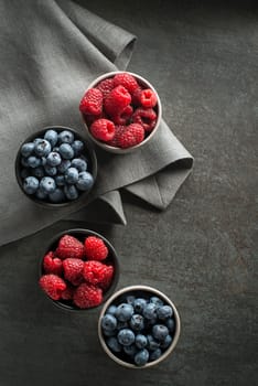 Berries overhead closeup colorful assorted mix of blueberry and raspberry